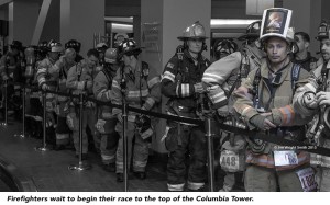 Firefighters wait to begin their race to the top of the Columbia Tower.